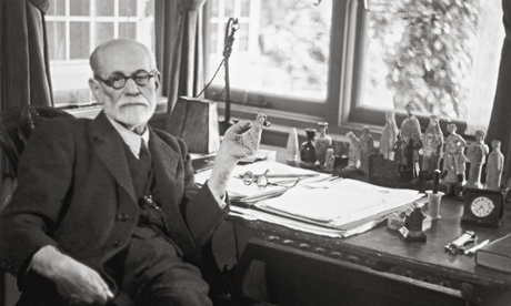 Sigmund Freud at his desk.