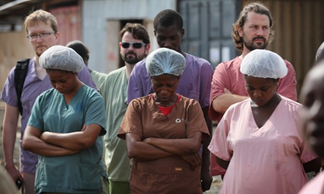 Health workers at an Ebola unit in Paynesville, Liberia.