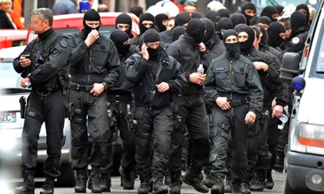 French special forces leave after the assault on the besieged flat of Mohamed Merah in March 2012.