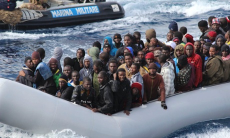 Migrants during a rescue operation by Italian navy off Sicily in in the operation called Mare Nostrum.