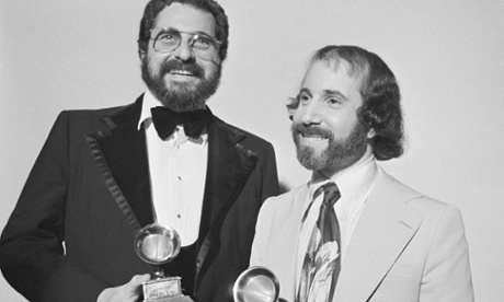 Paul Simon, right, won album of the year at the 1976 Grammys