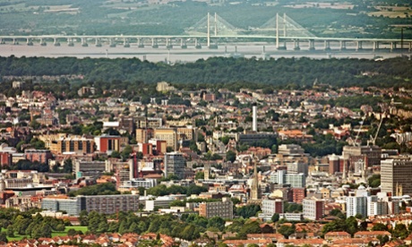 The city of Bristol and behind it, the M4 Second Severn Crossing into Wales.