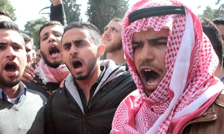 Jordanians shout slogans during a rally to condemn the killing of the Jordanian pilot killed by Isis.
