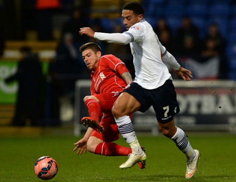 Liam Feeney avoids Alberto Moreno to cross one in.