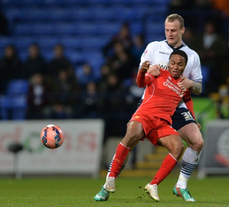 Raheem feels the force of  David Wheater.