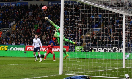 Andy Lonergan saves the shot of Raheem Sterling.