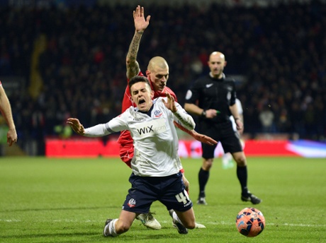 Zach Clough is brought down by Martin Skrte.