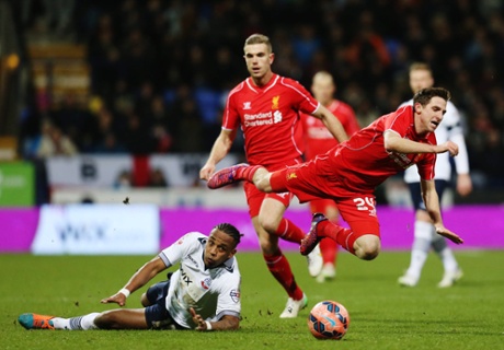 Neil Danns fouls Liverpool's Joe Allen and was subsequently sent off.