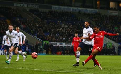 Raheem Sterling scores Liverpool's equalizer.