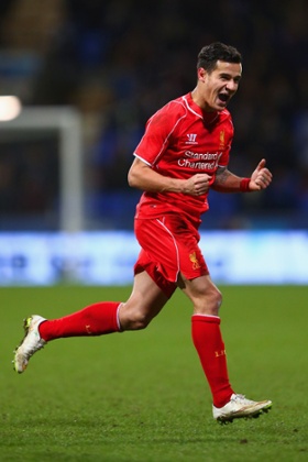 Philippe Coutinho celebrates scoring Liverpool's second.