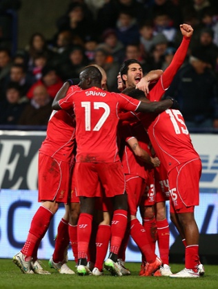 Liverpool celebrate winning the game.