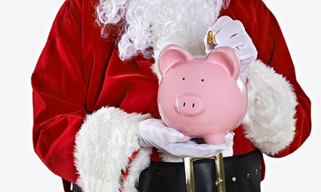 student santa with piggy bank