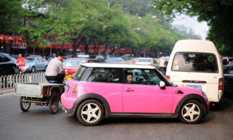 A Mini Cooper in traffic in Beijing, China.