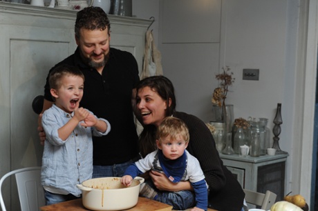 The family gathers for dinner, which will be stew.