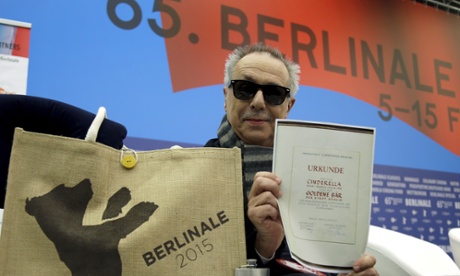 Dieter Kosslick director of the International Film Festival Berlin, the Berlinale, holds a copy of a 65 years old Golden Bear award certificate.