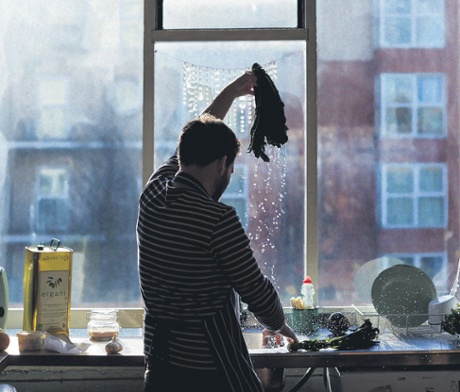 Tom Hunt washing cavolo nero in a warehouse.