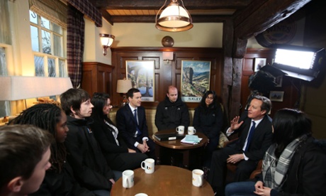 George Osborne and David Cameron speak to apprentices in The Woolpack pub, during a visit to the set of Emmerdale on the Harewood Estate near Leeds