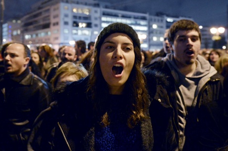 Crowds gather in front of the Greek parliament in Athens on February 5, 2015  in support of the new anti-austerity government's efforts to renegotiate Greece's international loans.