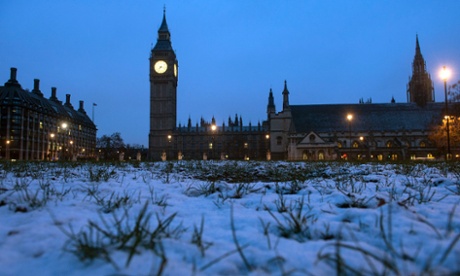 Light snow outside the Houses of Parliament, London.