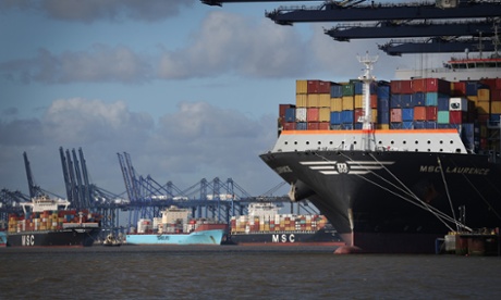Container ships are unloaded at Felixstowe port on October 17, 2013 in Felixstowe, England.
