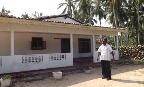 Father David outside his home on Delft island.