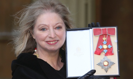 Hilary Mantel displays the Dame Commander of the British Empire medal 