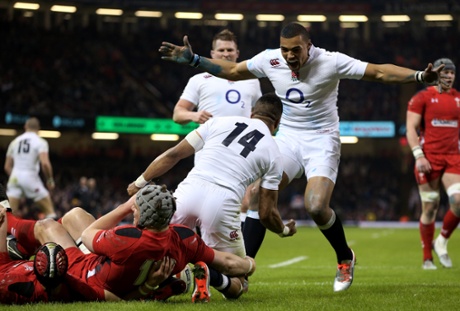 Anthony Watson is congratulated by Luther Burrell  after scoring.