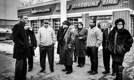 Members of the God Squad gather in the cold.