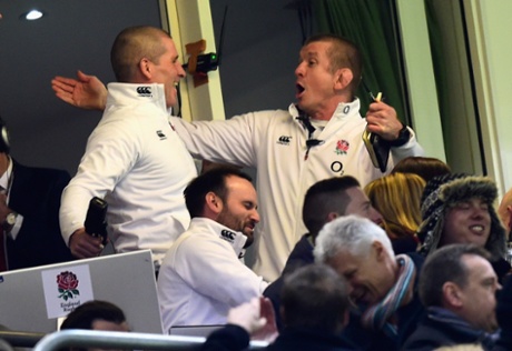 England coach Stuart Lancaster (c) and Graham Rowntree (r) celebrate victory.
