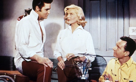 Elvis Presley, Lizabeth Scott and Hal Kanter in Loving You, 1957.