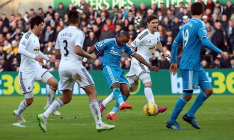 Jermain Defoe slams home the opening goal of the game.