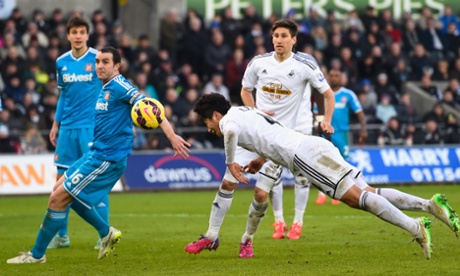 A fine diving header by Swansea City's Ki Sung-Yueng.