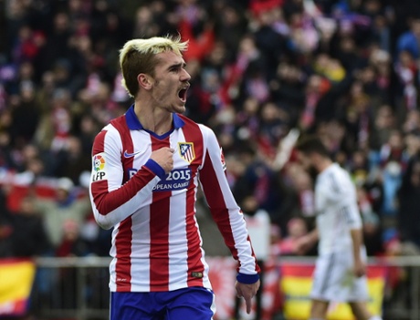 Atletico Madrid's Antoine Griezmann celebrates after scoring their third goal.