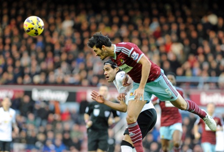 James Tomkins vies for the ball with Radamel Falcao.