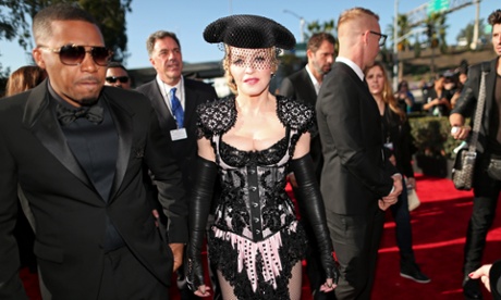 Madonna and Nas arrive at the Grammys.