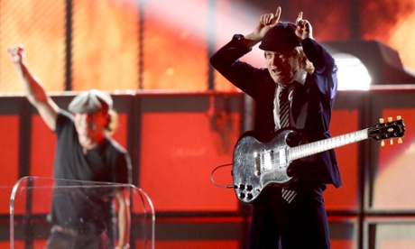Singer Brian Johnson (left) and guitarist Angus Young of AC/DC perform onstage at the Grammys.