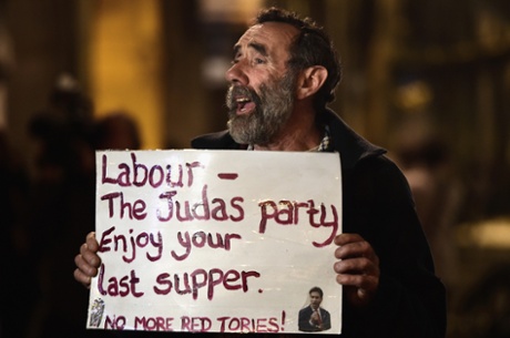 Demonstrators protest outside a Labour fundraiser in Glasgow in October 2014.