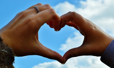 two hands making a love heart