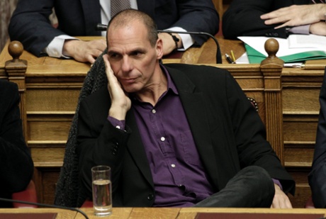 Greek Finance Minister Yanis Varoufakis looks on during the policy statements of the government at the parliament in Athens, Greece, last night.