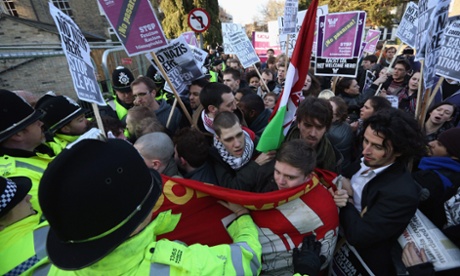 Protesters clash with police outside Cambridge University's Student Union as Marine Le Pen prepares to address the union's debating society.