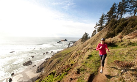 woman running along trail