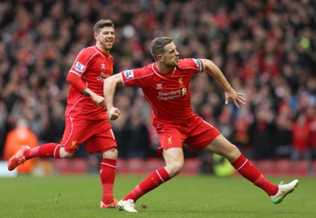 Jordan Henderson celebrates with Alberto Moreno after scoring the first goal.