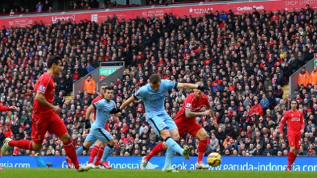 Edin Dzeko of Manchester City scores to make it 1-1.