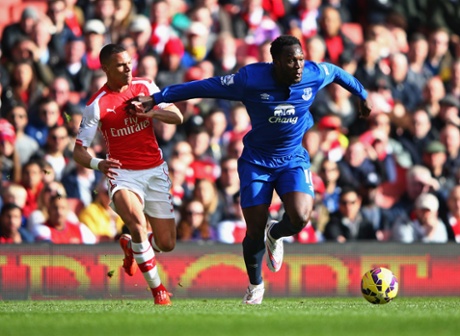 Romelu Lukaku holds off Kieran Gibbs.