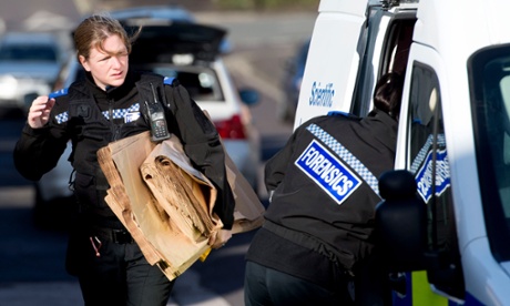 Police forensics officers outside Rebecca Watts' family home in Bristol, 1 March 2015. 