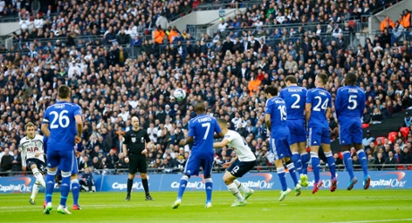 Christian Eriksen takes a free kick.