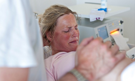 Woman giving birth in hospital