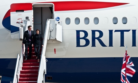 David Cameron and his wife Samantha disembark from a plane at Andrews Air Force Base in Maryland in 2012