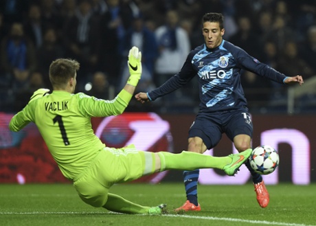 Goalkeeper Tomas Vaclik clears Porto's Cristian Tello's attempt.