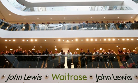 John Lewis partnership and Waitrose employees wait for the announcement of their annual results